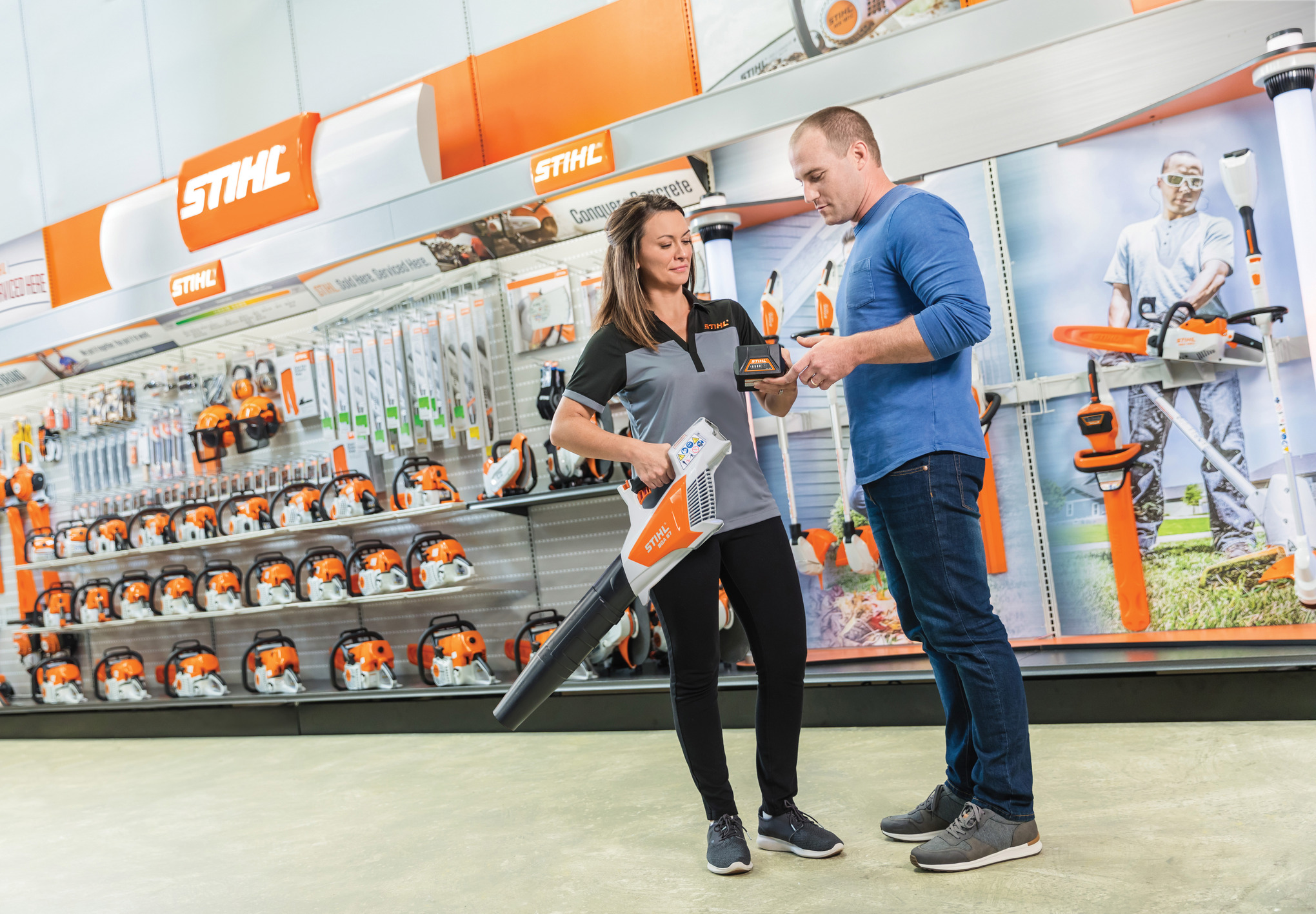STIHL dealer helping customer in store