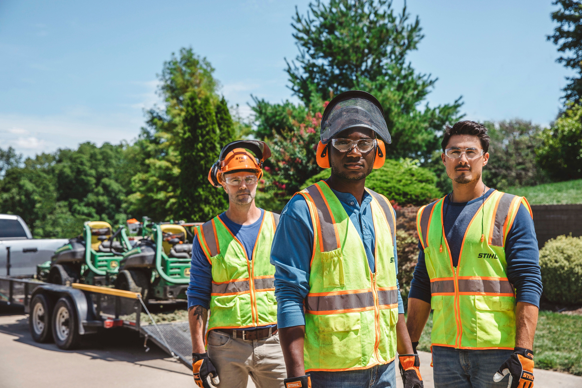 Landscapers Wearing STIHL Personal Protective Equipment
