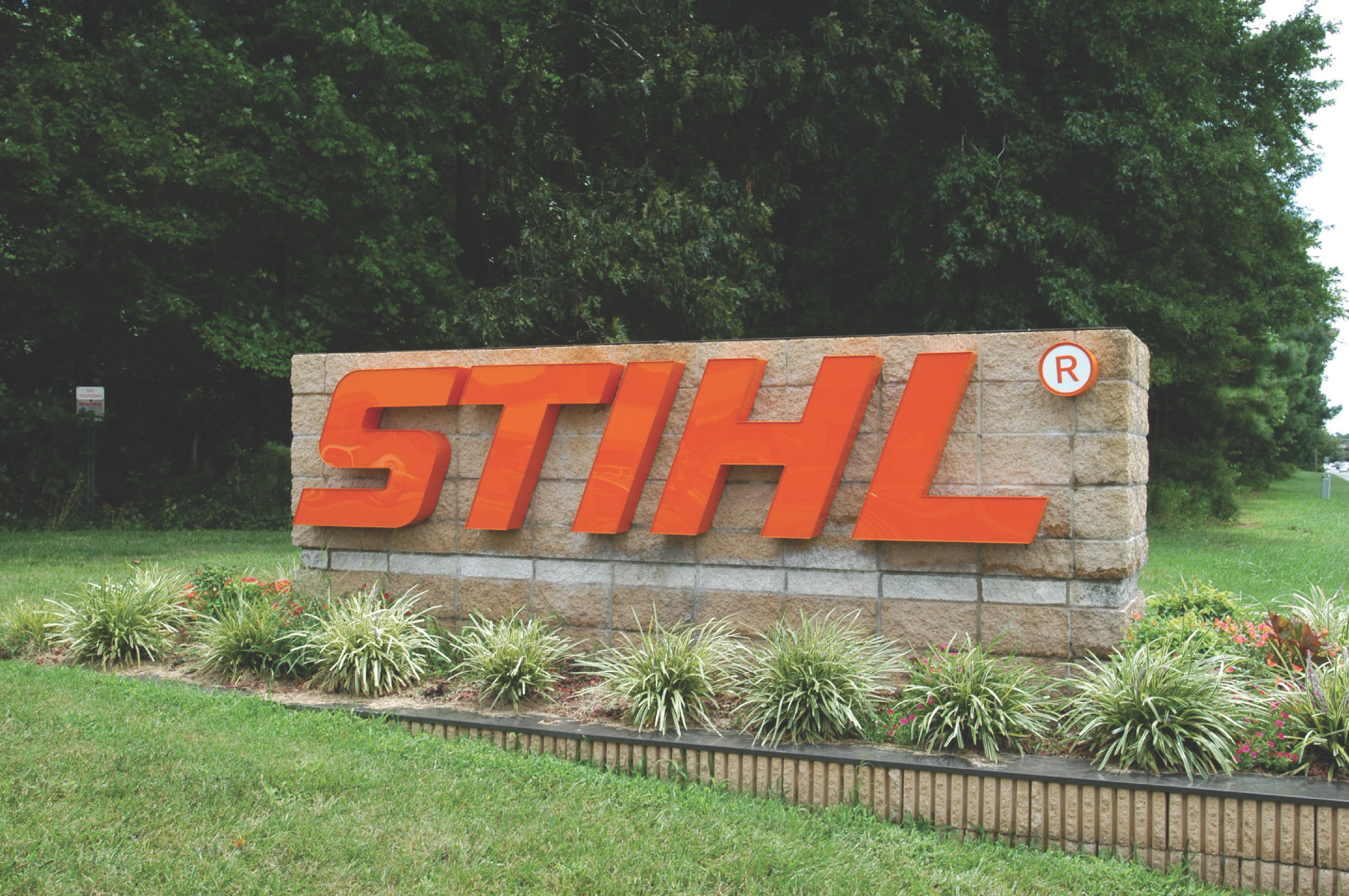 STIHL logo on brick wall