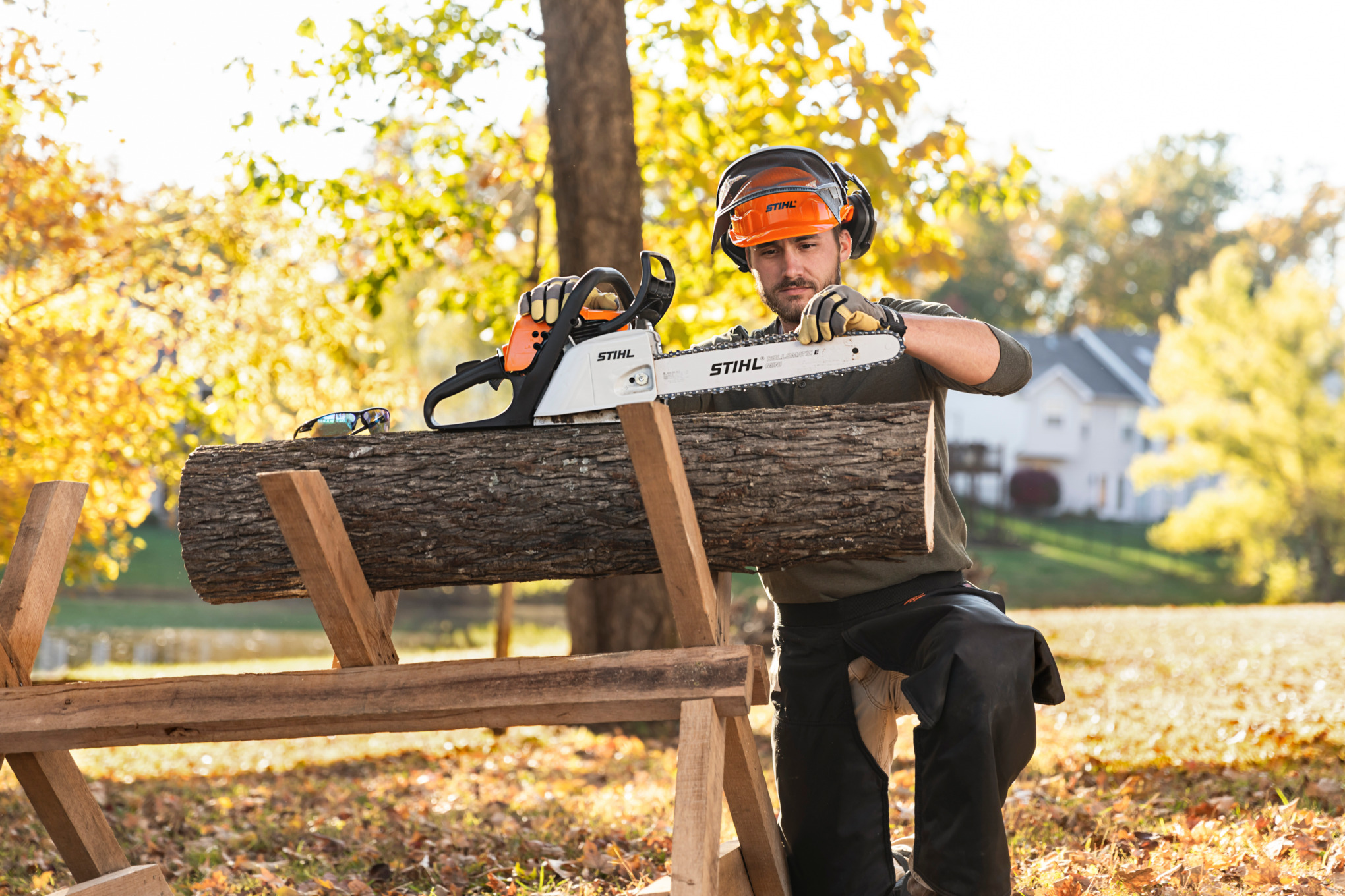 Man Starting STIHL Chainsaw