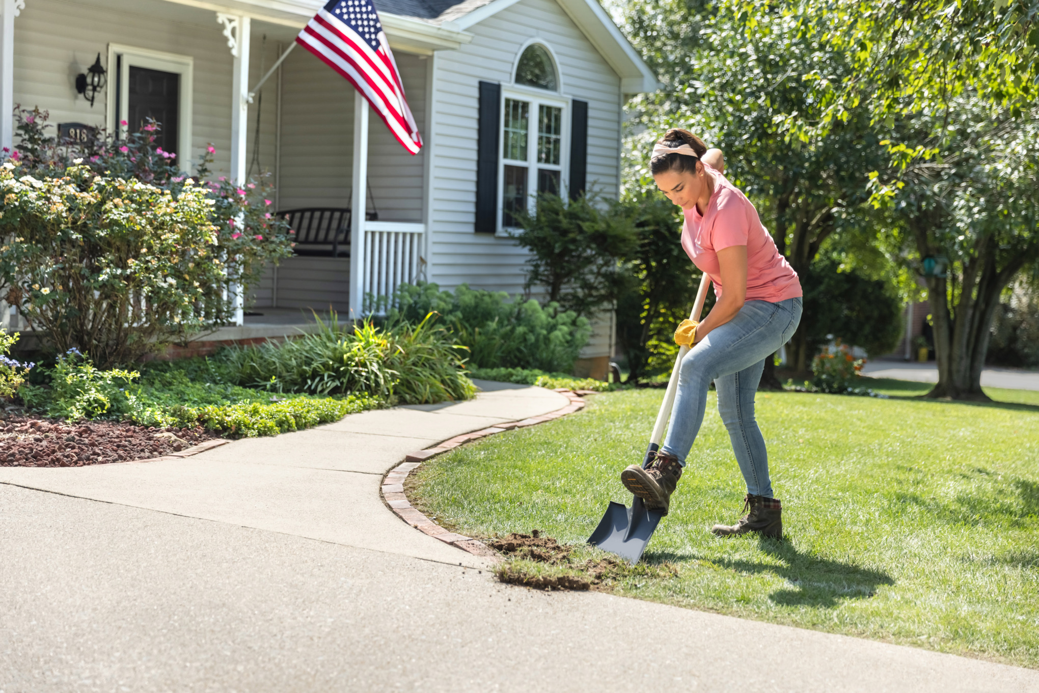 Sara Bendrick removing top layer of grass