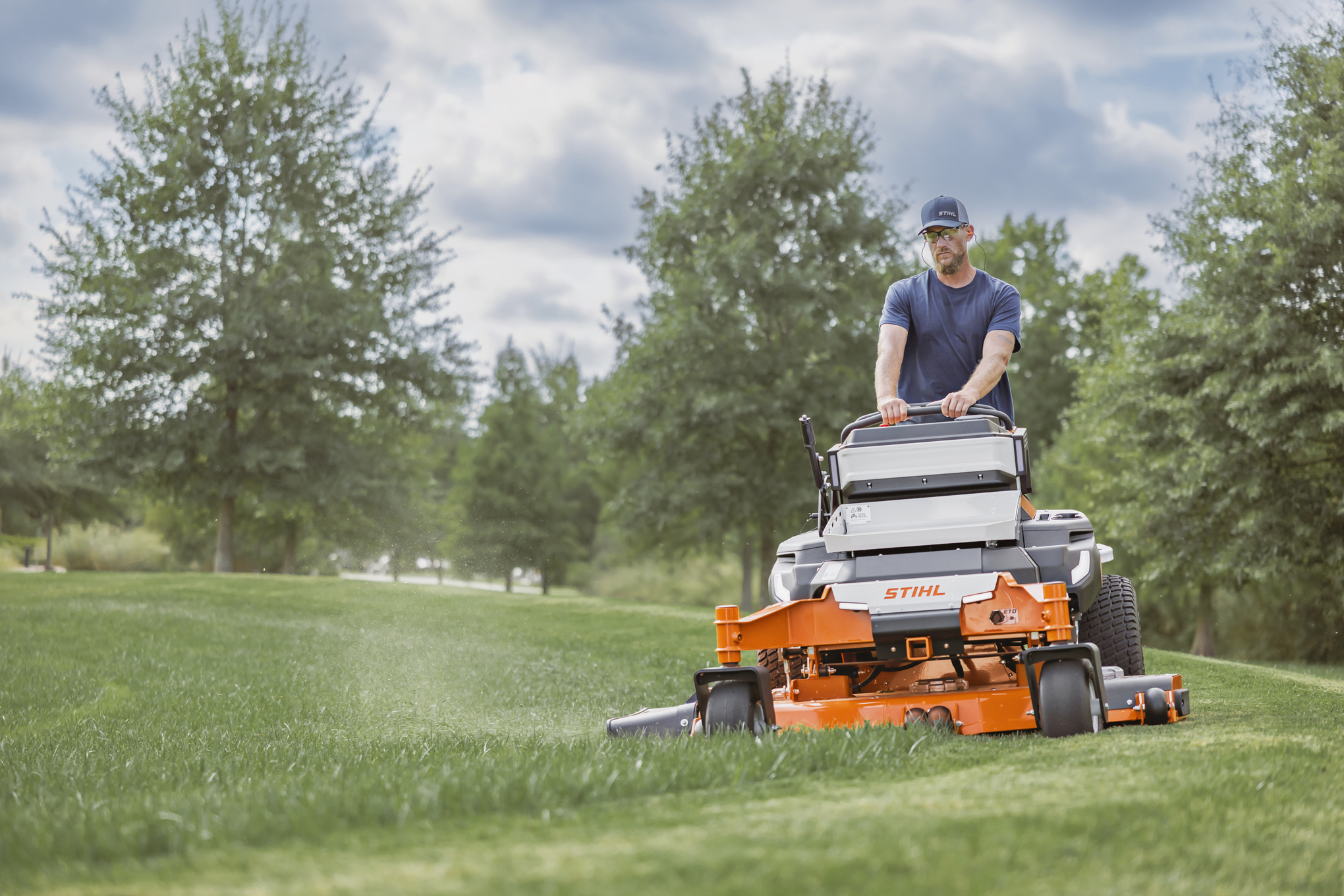 Man riding STIHL Zero-Turn Mower