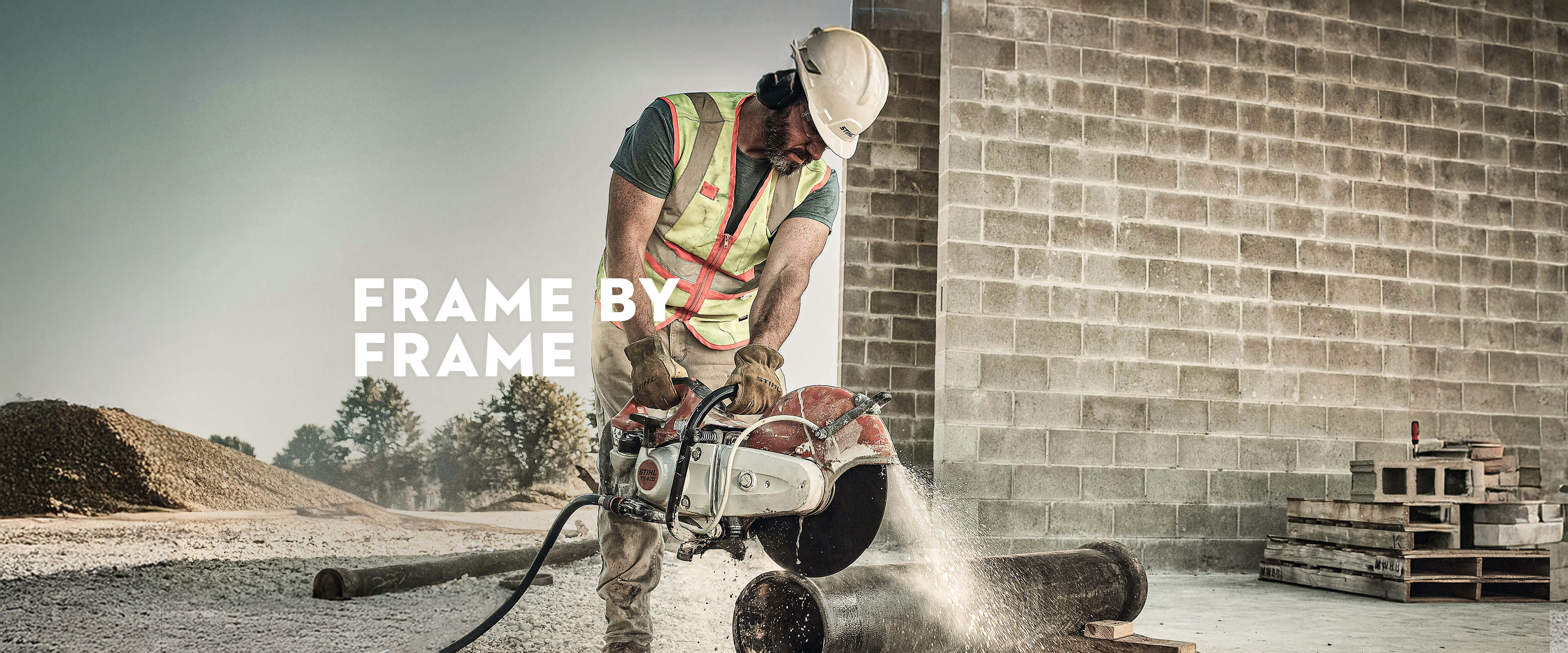 Construction worker using the STIHL TS 420 Cutquik to cut through metal pipe