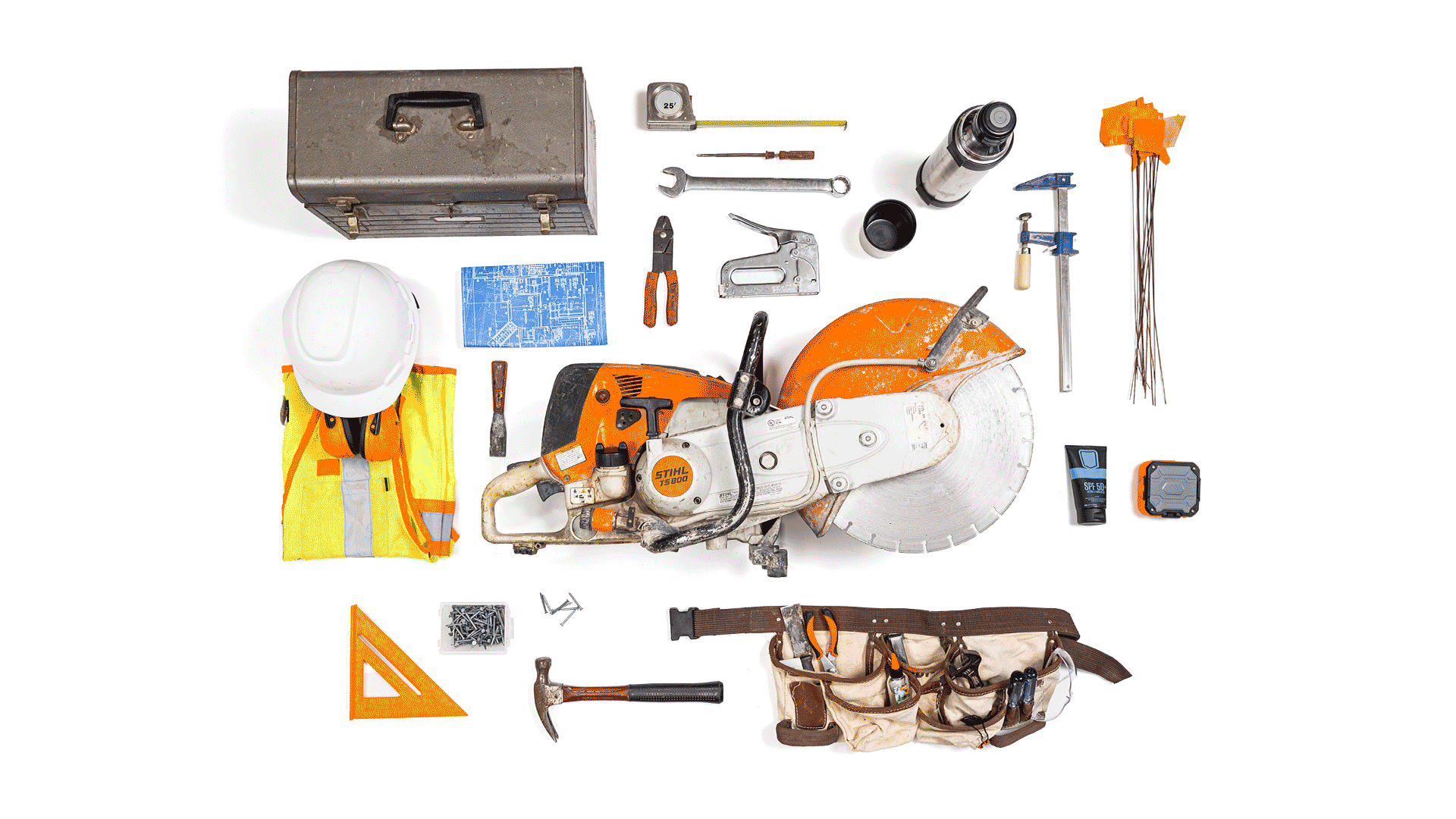 Knolling image of essential construction worker gear including STIHL cutquik machine