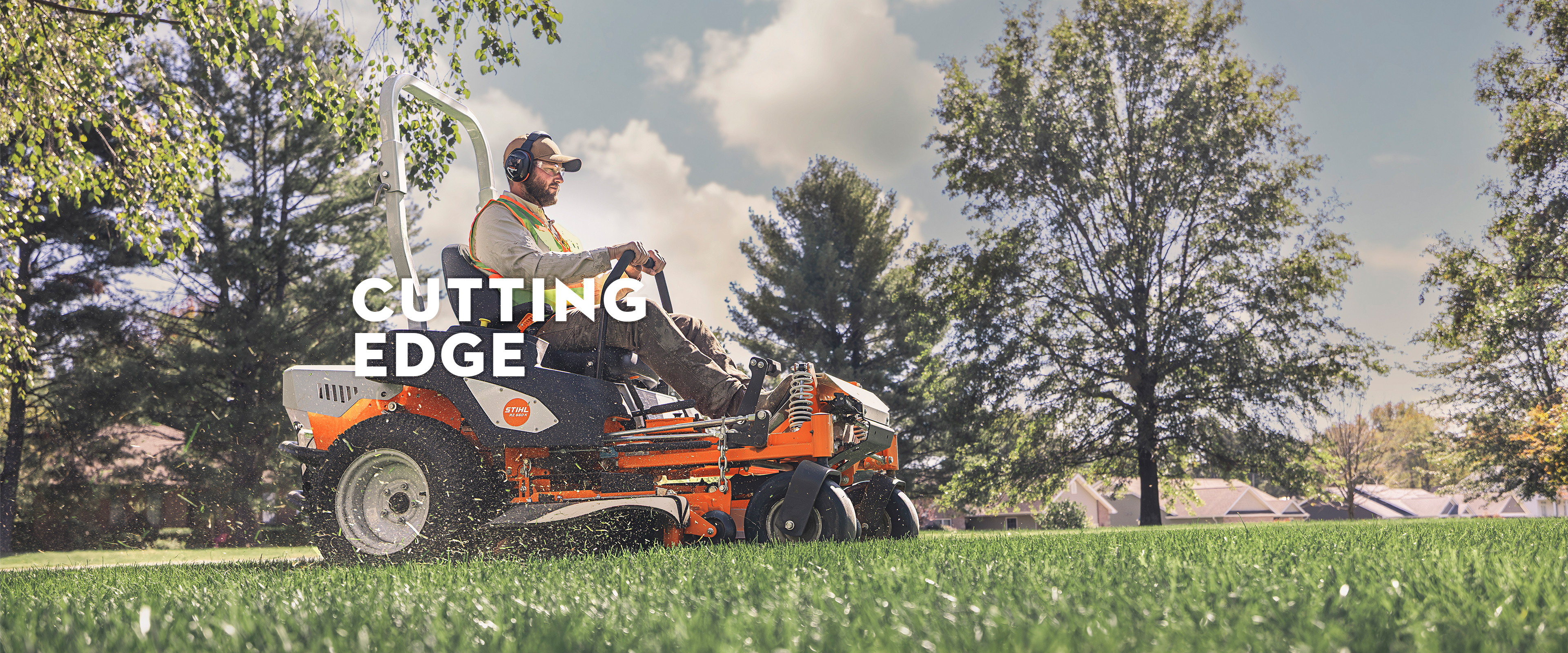 Landscaper using the STIHL RZ 560 K to mow grass