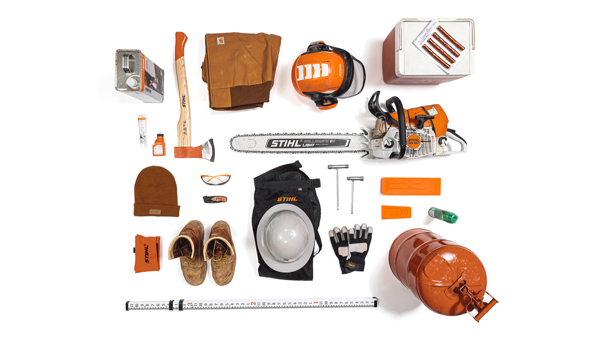 Knolling image of essential logger gear including STIHL personal protective equipment and STIHL MS 661 MAGNUM®