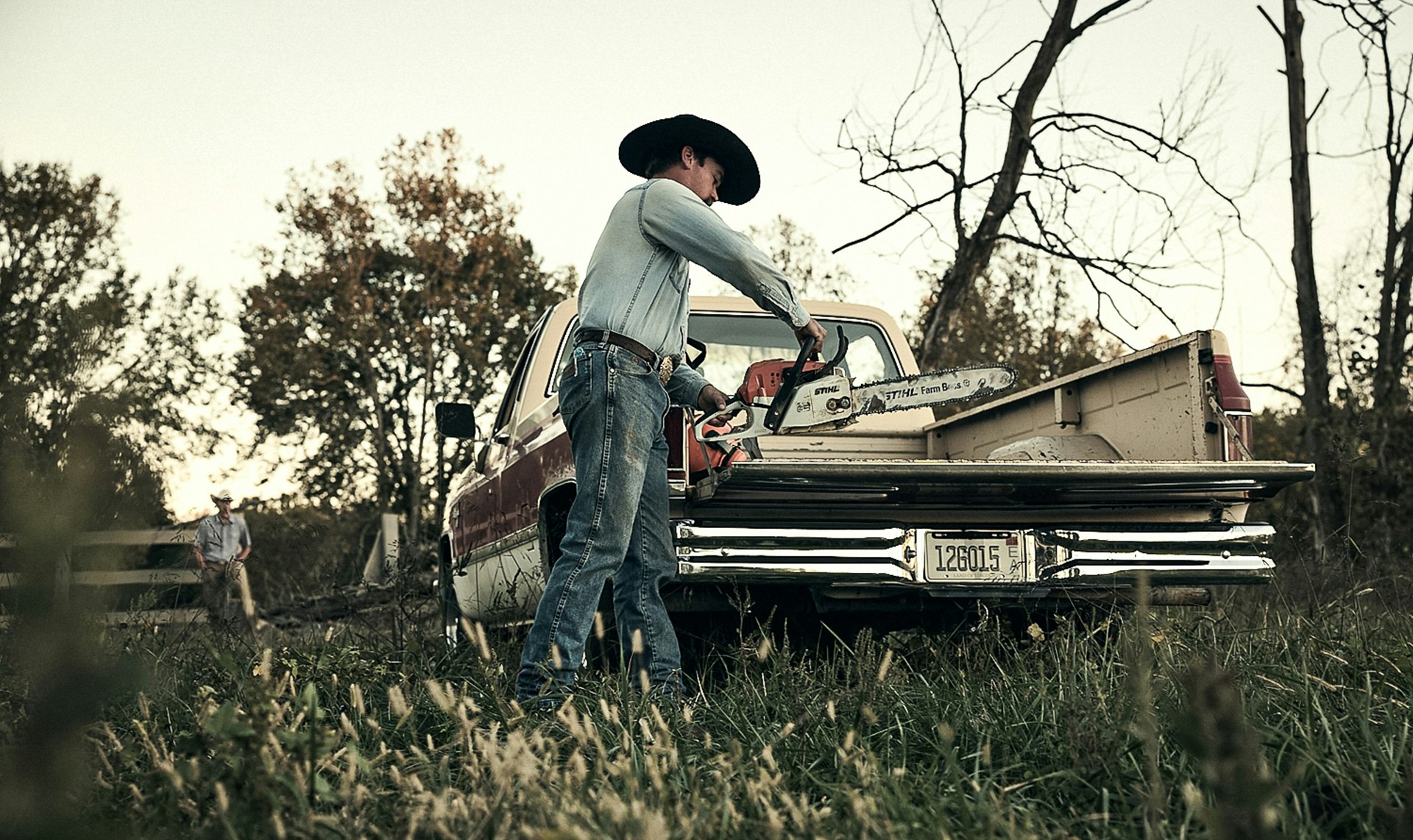 Rancher places STIHL MS 271 FARM BOSS® on the back of truck bed