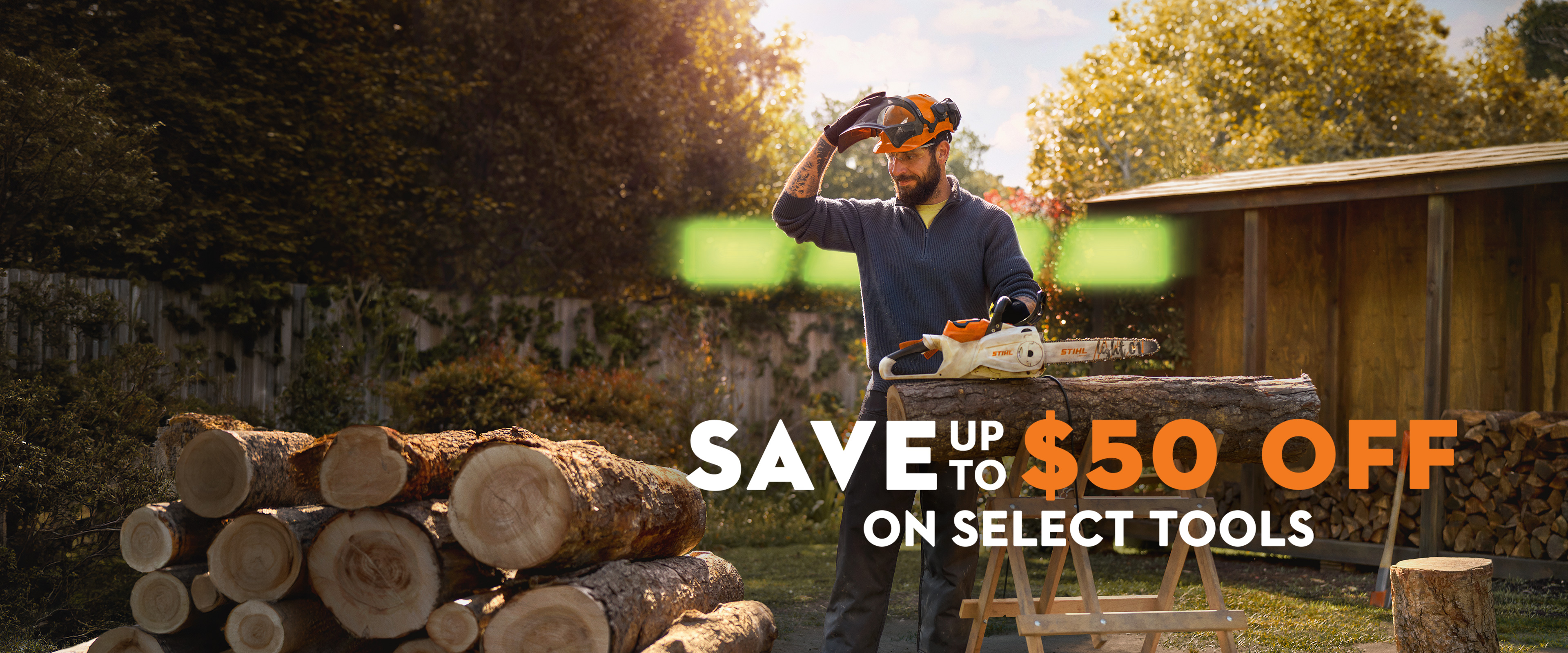 STIHL fall savings promotion featuring a person operating a chainsaw with messaging highlighting up to $50 off select chainsaws, blowers, and pruner sets.