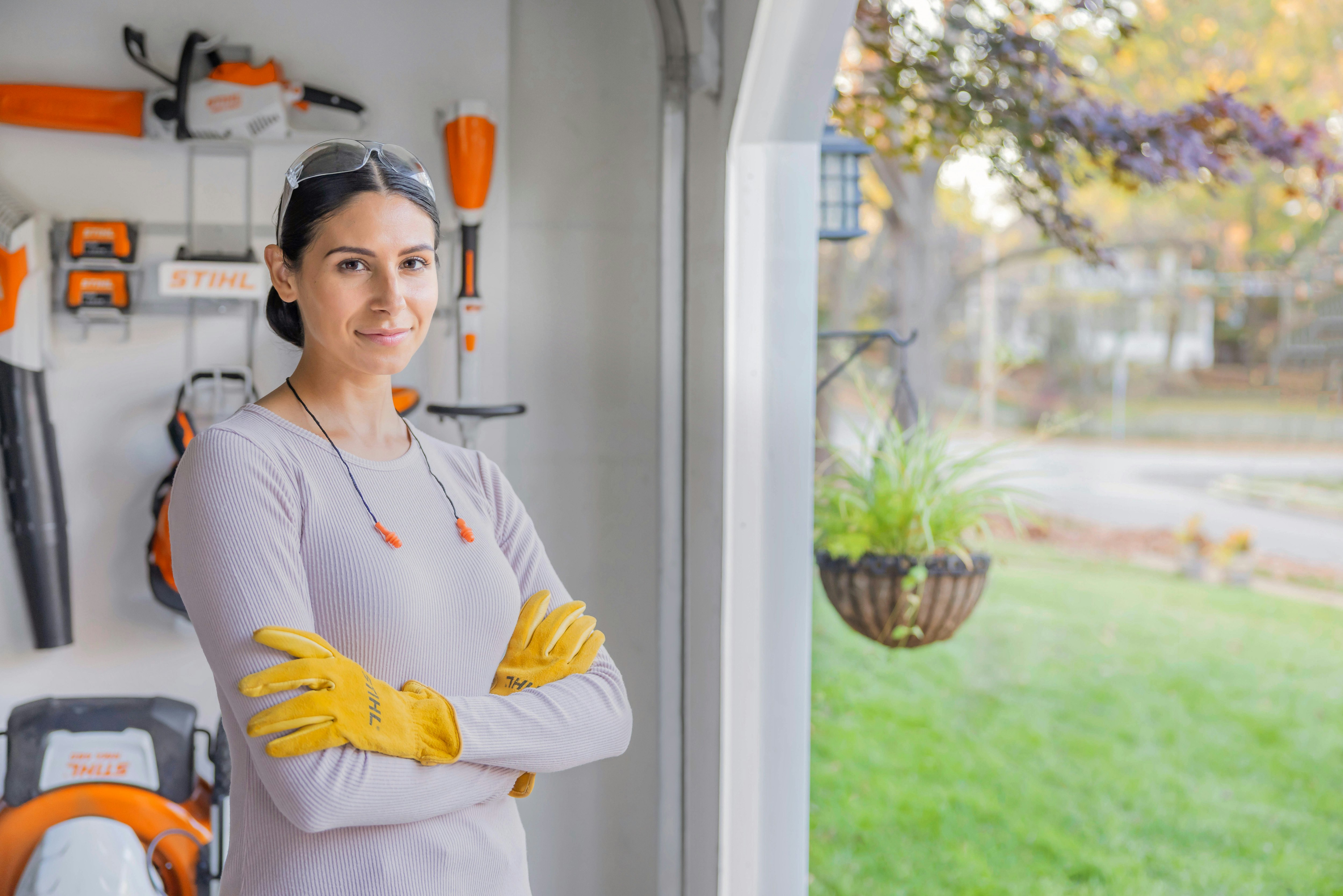 Woman in Garage with STIHL Tools