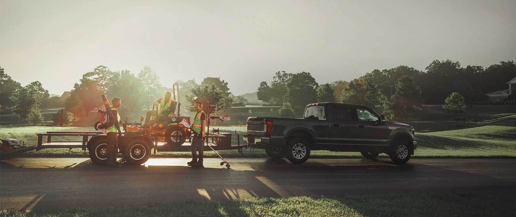 Professionals infront on work trailer