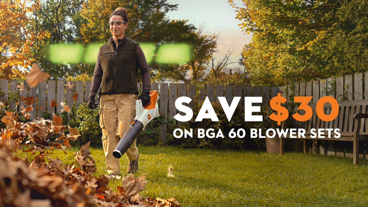 Person using a STIHL BGA 60 battery-powered blower during fall leaf cleanup with promotional messaging highlighting $30 in savings on blower sets.