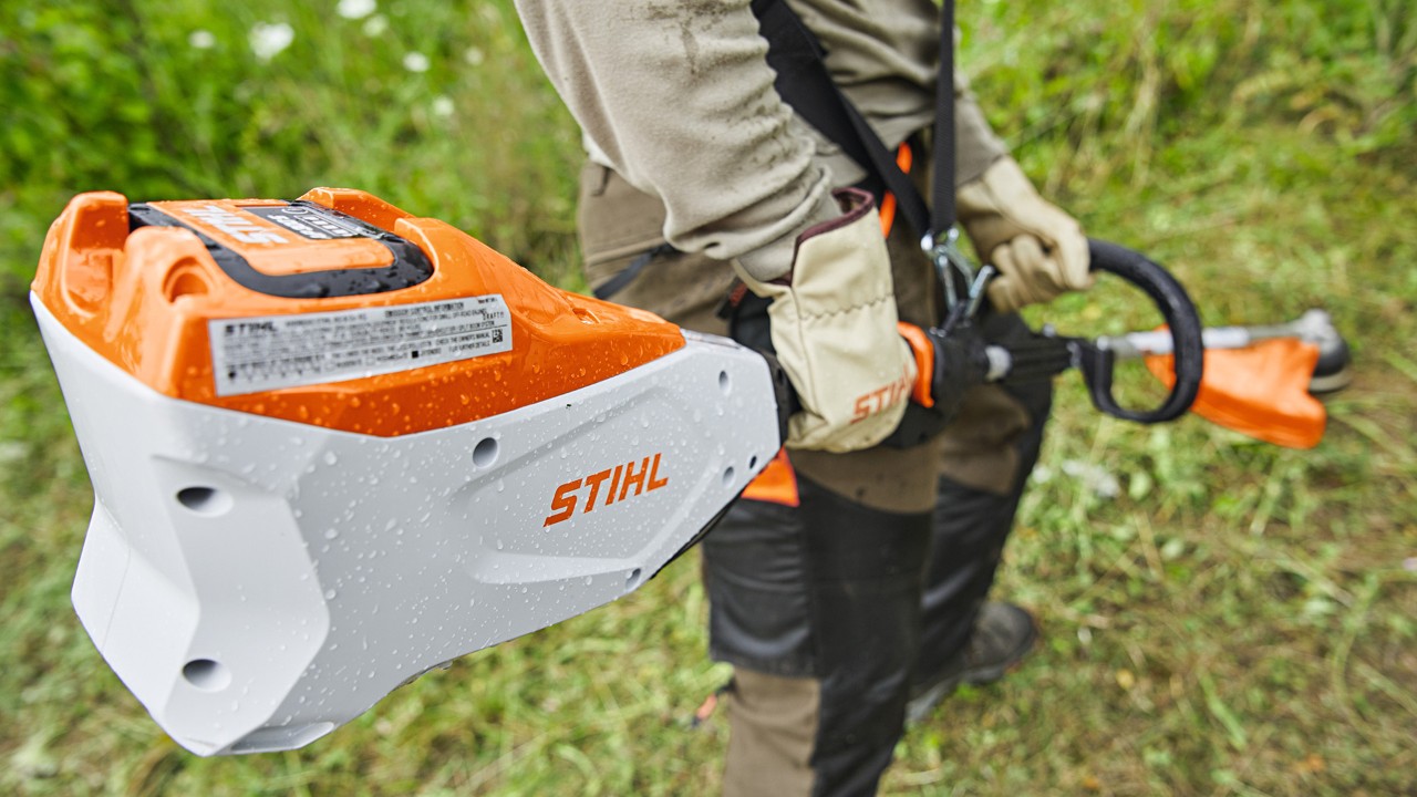 STIHL battery pack attached to a cordless string trimmer
