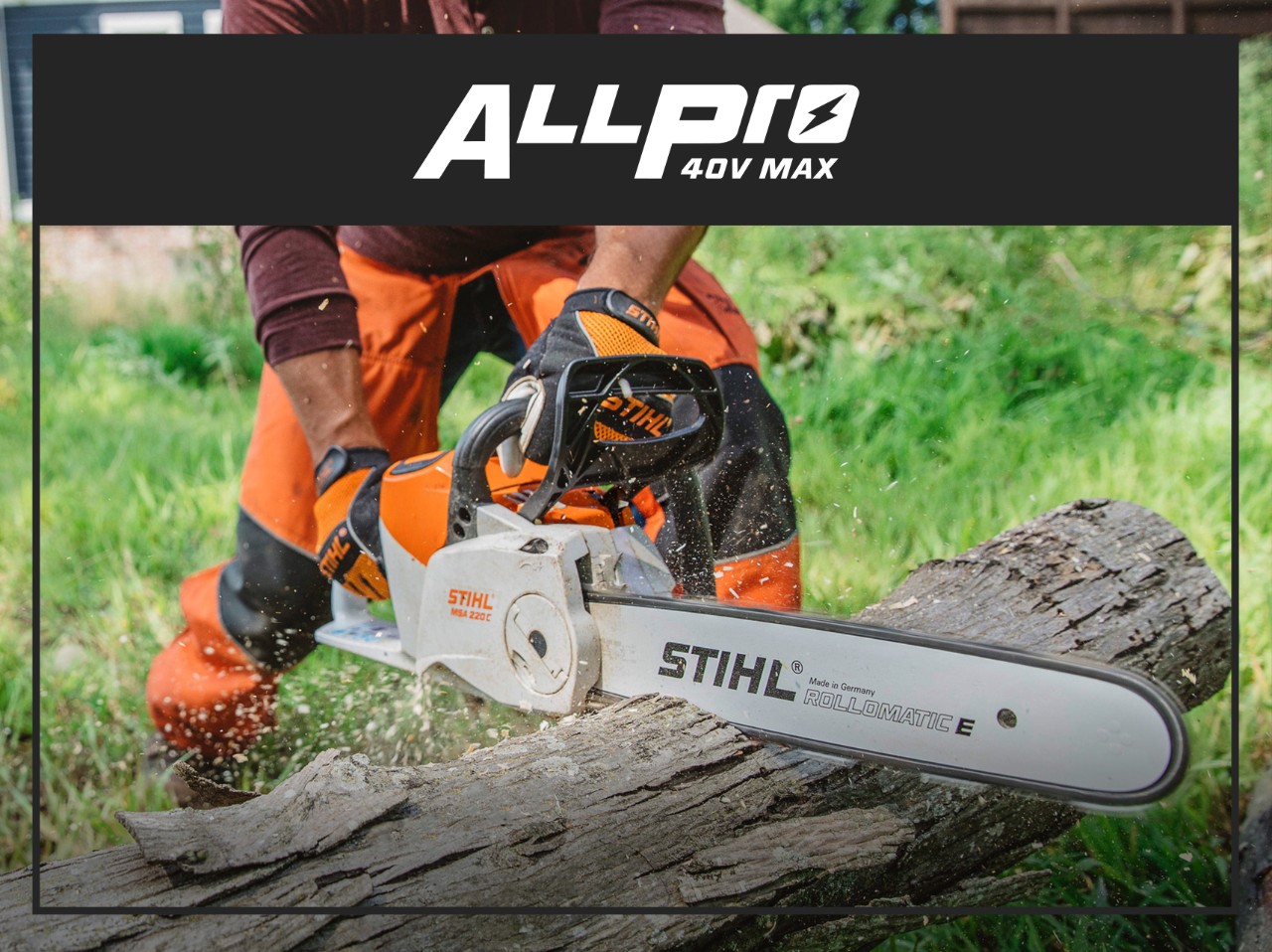 STIHL AP System battery-powered chainsaw cutting a large log outdoors