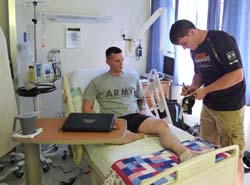 STIHL TIMBERSPORTS United States Lumberjack Champion Matt Cogar signs an autograph for a patient during his visit to the largest military hospital outside of the continental U.S., the Landstuhl Regional Medical Center in Landstuhl, Germany on Aug. 6. STIHL TIMBERSPORTS United States Lumberjack Champion Matt Cogar signs an autograph for a patient during his visit to the largest military hospital outside of the continental U.S., the Landstuhl Regional Medical Center in Landstuhl, Germany on Aug. 6.